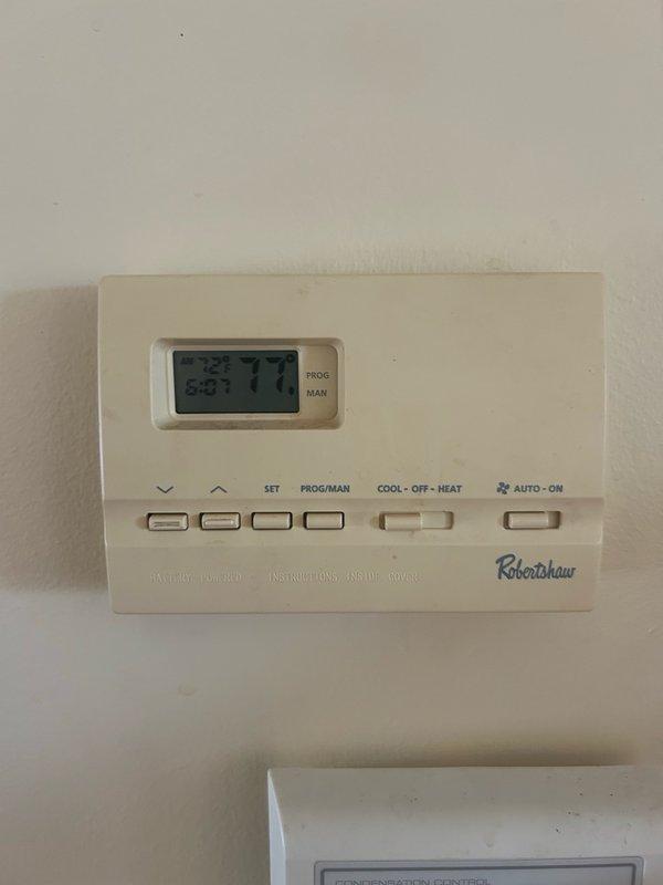 Responded to callback for Unit 10 regarding thermostat unable to maintain temperature, with indoor conditions exceeding 80°F. Diagnosed Robertshaw programmable thermostat in auto schedule mode, causing cooling setpoint to automatically revert to 82°F. Reset thermostat programming, switched unit from program mode to manual hold mode, and adjusted cooling setpoint to 72–74°F. Verified system operation and confirmed proper cooling cycle before departure.