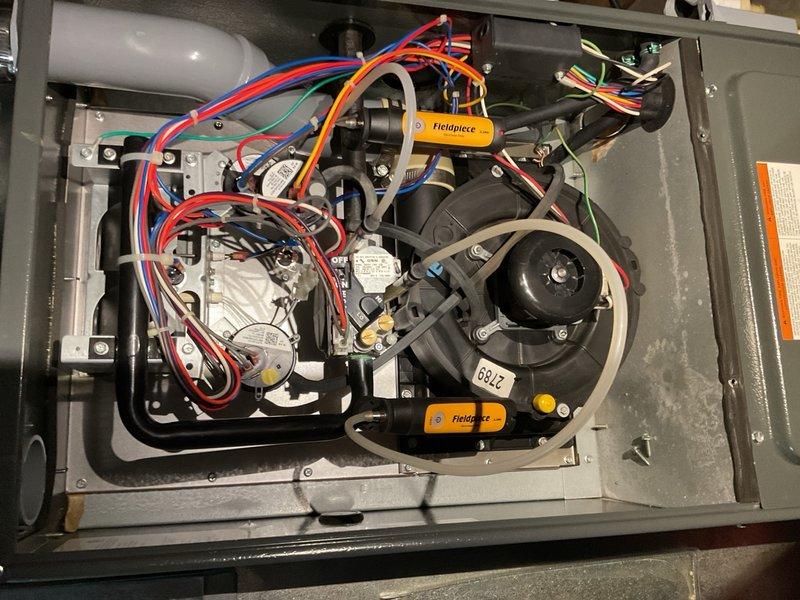 Completed comprehensive HVAC maintenance agreement service including full furnace and air conditioning system tune-up inspections. Performed thorough furnace inspection with focus on heat exchanger condition, inducer motor operation, and all safety controls; heat exchanger shows good condition with no cracks or deterioration, though inducer motor exhibits slightly elevated noise levels during operation but remains within acceptable parameters. Conducted complete air conditioning system evaluation including inspection of refrigerant lines, condensate drainage system, blower motor assembly, electrical connections, and all mechanical components; all systems operating properly with no issues identified and equipment showing normal wear consistent with age.