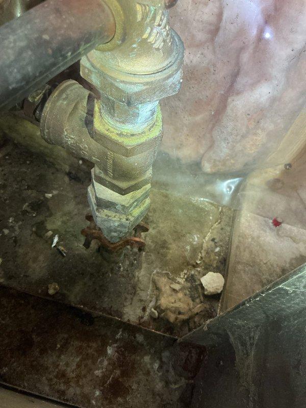 Responded to low water pressure issue caused by failing main line shut-off valve. Coordinated with customer regarding city water shut-off schedule. Replaced deteriorated gate valve with new ball valve at main water line entry point. Old valve showed significant corrosion and oxidation, which was restricting water flow and causing pressure issues throughout the property. New ball valve installation provides improved shutoff capability and full-port flow for restored water pressure. System tested and operational upon completion.