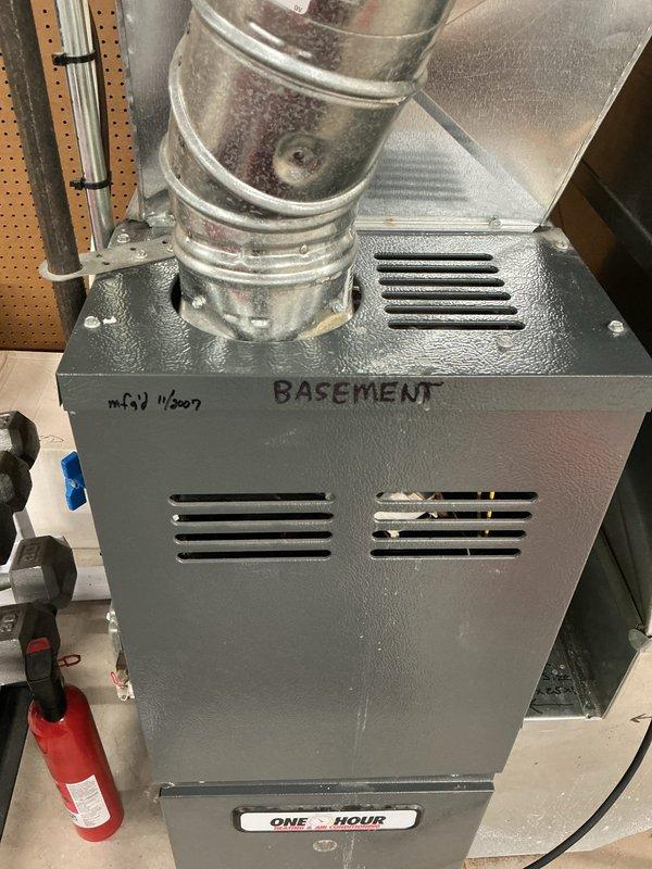 Performed furnace tune-up and safety inspection on a 19-year-old unit. Heat exchanger inspection revealed no visible cracks but identified stress points showing signs of potential future failure. CO readings in the flue measured elevated at 220-240 ppm during high fire operation, while gas pressure remained within acceptable range. These findings indicate likely heat exchanger deterioration not visible during inspection. Scheduled furnace replacement estimate for same day due to safety concerns and age of equipment.