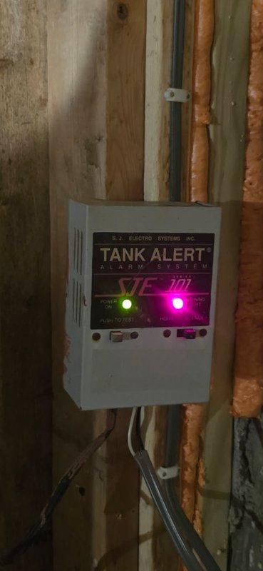 Responded to activated Tank Alert alarm system on septic system. Upon arrival, determined alarm was triggered following recent reconnection of system after remodeling work. Performed diagnostic testing on sewage ejector pump, which operated properly under manual activation. Identified malfunctioning float switches as root cause of alarm condition and pump failure to cycle automatically. Removed defective float assembly and installed new sewer float switch to restore proper automatic pump operation and normal system function.