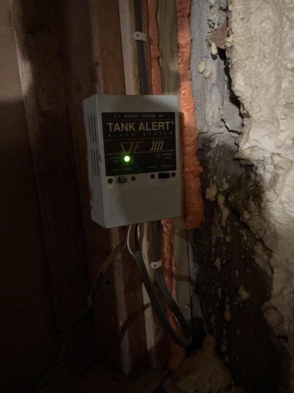 Responded to activated Tank Alert alarm system on septic system. Upon arrival, determined alarm was triggered following recent reconnection of system after remodeling work. Performed diagnostic testing on sewage ejector pump, which operated properly under manual activation. Identified malfunctioning float switches as root cause of alarm condition and pump failure to cycle automatically. Removed defective float assembly and installed new sewer float switch to restore proper automatic pump operation and normal system function.