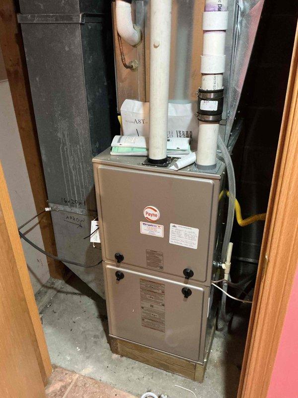 Completed comprehensive heating and cooling maintenance tune-up on Payne furnace and AC system. Performed furnace inspection including cleaning flame sensor, flushing condensate trap, replacing completely plugged air filter, and verifying all electrical components within specification. Confirmed proper gas pressure and achieved 50° temperature rise on startup. Conducted AC system inspection with electrical component verification, flushed condenser coils, confirmed evaporator drain functionality, and verified 20° temperature drop on startup. All systems operating properly and within manufacturer specifications.