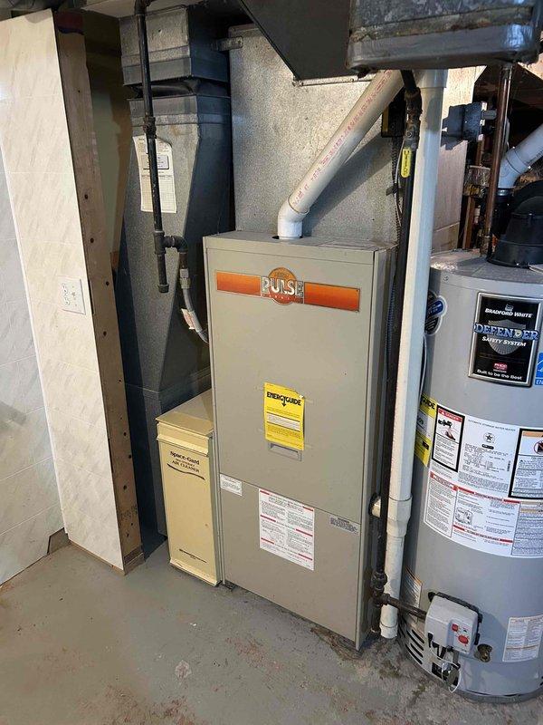 Returned for follow-up service on no-cool complaint after allowing system to fully thaw from previous day's iced condition. Diagnosed 1989 AC system low on R-22 refrigerant. Advised customer that Pulse furnace has very limited parts availability due to age and discontinuation. Service advisor scheduled to provide replacement system estimate.