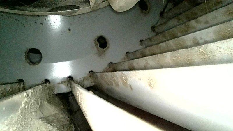 Responded to no cooling complaint on 1985 HVAC system with reported loud noise from furnace blower compartment. Upon inspection, discovered deceased mouse lodged in lower blower wheel causing severe imbalance and operational failure. Removed animal debris from blower assembly and cleared downed tree branch from outdoor condensing unit that was obstructing airflow and damaging components. 

Found 20x20x1 air filter completely impacted with pet hair and debris; tenant confirmed filter had not been serviced in over 12 months. Replaced filter and restored power to system. Unit restarted and achieved cooling operation within parameters expected for equipment of this age and condition.

System exhibits significant operational limitations due to advanced age (38+ years), extended maintenance neglect, restricted airflow from filter blockage, and physical damage to outdoor unit from fallen debris. Advised that while system is currently functional, the combination of age-related component wear, 