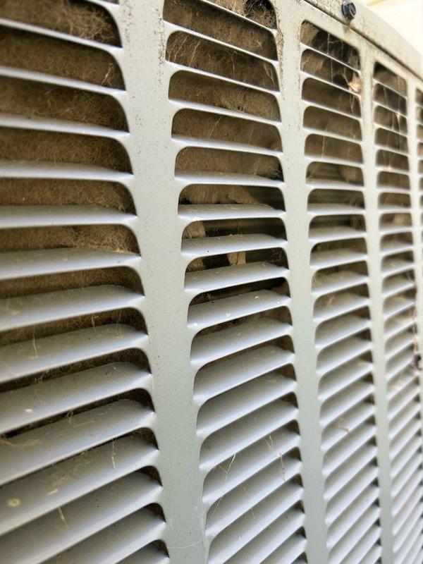 Responded to no cooling complaint on 7-year-old Daikin system. Upon arrival, discovered outdoor condenser coil heavily impacted with dirt and debris, and capacitor had failed. Verified indoor air filter was clean, blower motor operating correctly, and airflow adequate through supply registers. Replaced failed capacitor and performed thorough condenser coil cleaning to restore proper heat transfer capability. 

After completing repairs and restarting system, monitored operating pressures and temperatures. While system pressures showed improvement from initial readings, high-side pressure remained elevated and suction line temperature indicated insufficient cooling. Conducted comprehensive TXV bulb response testing using both warm and cold water applications while monitoring suction pressure, superheat, and subcooling values. Testing revealed no meaningful changes in system parameters, indicating TXV is not responding to temperature variations as designed.

System currently runs but fail