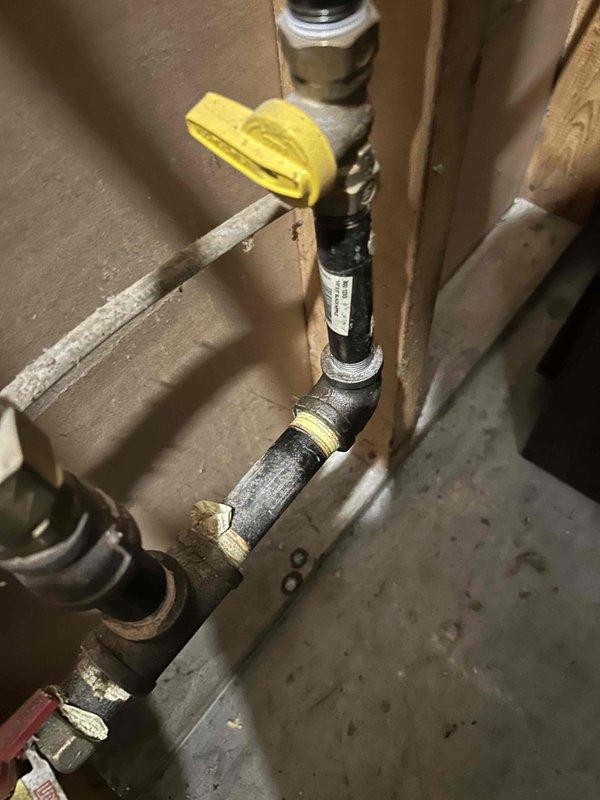 Responded to gas leak alarm concerns in basement following recent LP tank and regulator replacement by gas provider. Performed comprehensive leak detection using combustible gas detector at all accessible fittings, connections, and gas piping throughout the system with no detectable leaks found. No odor of gas present during inspection. Evaluated customer's gas detector and determined unit to be low-grade residential model that may be producing false readings. Recommended customer upgrade to higher-quality detection equipment or contact gas provider to perform formal pressure test on gas lines, as regulator adjustments fall under utility company jurisdiction and are outside scope of HVAC service work.