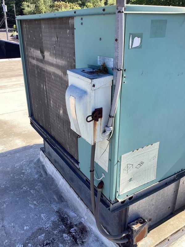 Responded to commercial rooftop unit that had been out of service for five years. Upon arrival, found RTU heavily infested with active wasp nest throughout the unit. Applied two cans of wasp spray but encountered continued swarming activity that prevented safe access to equipment for diagnostic evaluation. Advised customer that pest infestation must be professionally cleared before HVAC assessment and repairs can proceed, and scheduled return visit once unit is accessible.