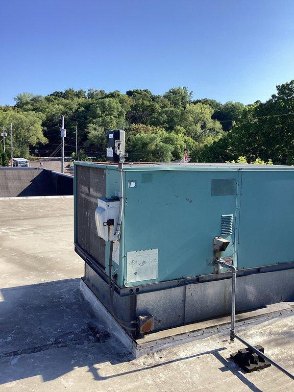 Responded to commercial rooftop unit that had been out of service for five years. Upon arrival, found RTU heavily infested with active wasp nest throughout the unit. Applied two cans of wasp spray but encountered continued swarming activity that prevented safe access to equipment for diagnostic evaluation. Advised customer that pest infestation must be professionally cleared before HVAC assessment and repairs can proceed, and scheduled return visit once unit is accessible.