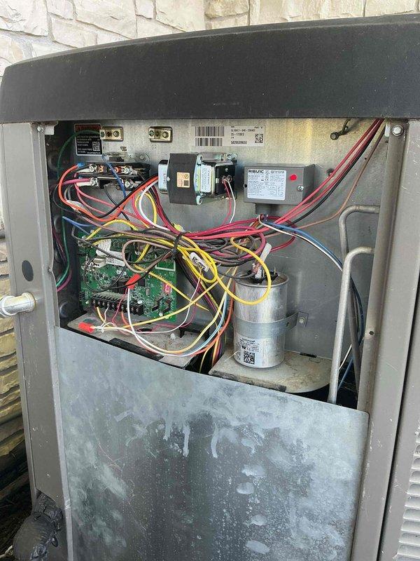 Responded to no cooling complaint on newer HVAC installation. Previous electrician had replaced transformer but unit remained non-operational. Retrieved RIB relay from shop and returned to site to complete repair. Installed RIB relay on condenser unit, restoring proper control circuit operation. Tested system operation and confirmed air conditioning unit returned to full functionality. Unit now cooling properly with all electrical components operating as designed.