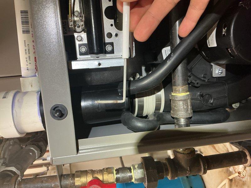 Completed annual heating maintenance on 2 Lennox furnaces, 1 high-efficiency boiler, 3 HRV air exchangers, and 1 garage heater. On the utility room furnace, cleaned flame sensor, tested capacitor, inspected inducer motor and control board, flushed condensate drain line, verified CO level at 14 ppm and gas pressure at 3.52 w.c. - all within normal parameters. Serviced high-efficiency boiler by cleaning flame sensor and igniter, cleaning condensate trap, and confirming system pressure at 17-18 PSI and CO level at 68 ppm; verified all 3 zones operating properly. Vacuumed and serviced all air exchanger units. All equipment tested and confirmed operating within manufacturer specifications.