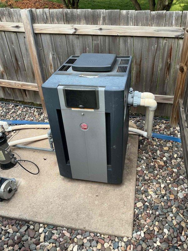 Responded to report of gas odor near furnace. Conducted thorough gas leak inspection and located leak at pilot line fitting on pool heater gas valve. Tightened loose fitting to stop gas leak. Performed comprehensive leak test on all remaining gas fittings in the area with no additional leaks detected. System restored to safe operating condition.