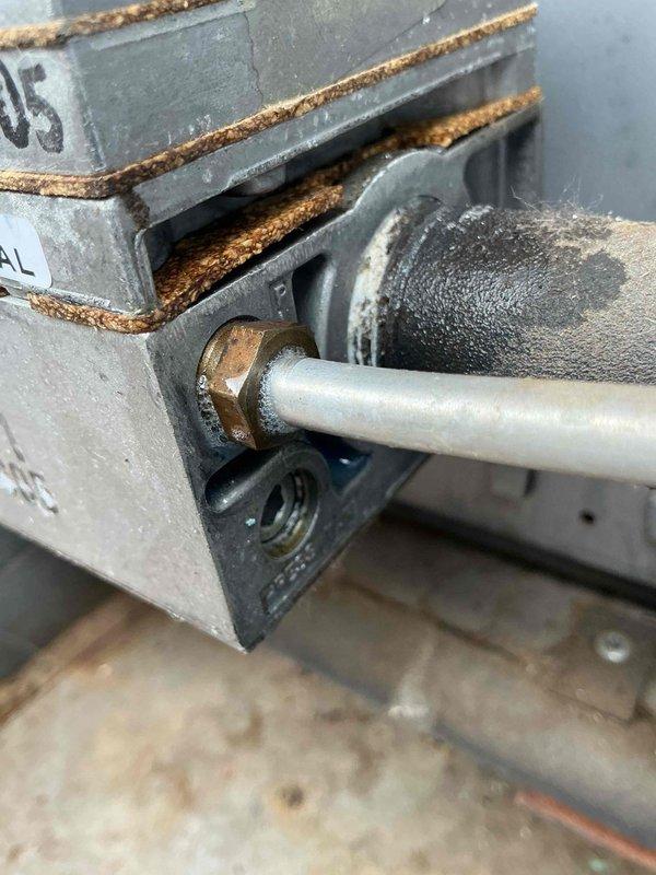Responded to report of gas odor near furnace. Conducted thorough gas leak inspection and located leak at pilot line fitting on pool heater gas valve. Tightened loose fitting to stop gas leak. Performed comprehensive leak test on all remaining gas fittings in the area with no additional leaks detected. System restored to safe operating condition.