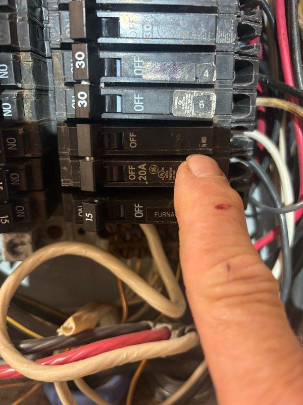 Responded to failed inspection callback for improper circuit breaker amperage rating. Replaced incorrectly installed 30-amp AC breaker with proper 25-amp breaker to meet maximum fuse specifications and code requirements. Documented corrected installation with photographs of electrical panel showing updated breaker configuration for inspection approval.