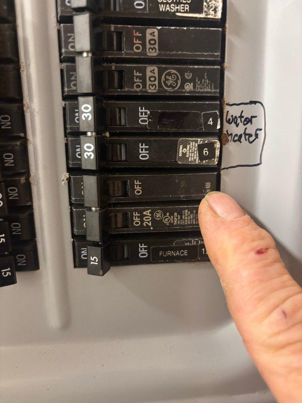 Responded to failed inspection callback for improper circuit breaker amperage rating. Replaced incorrectly installed 30-amp AC breaker with proper 25-amp breaker to meet maximum fuse specifications and code requirements. Documented corrected installation with photographs of electrical panel showing updated breaker configuration for inspection approval.