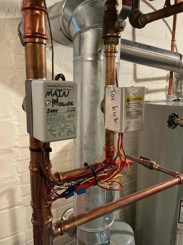Completed annual fall heating maintenance visit on residential Slant Fin boiler system, air exchanger, and dryer vent cleaning. Performed comprehensive inspection of boiler including all piping, two-zone operation, circulator pump, backflow preventer, pressure relief valve, heat exchanger, burners, system pressure, and combustion analysis—all components found to be functioning within acceptable parameters with no leaks detected. Combustion testing revealed 1 PPM carbon monoxide emission from lower heat exchanger seals beginning to deteriorate, which does not require immediate shutdown but warrants continued monitoring. Reviewed repair and replacement options with customer and scheduled follow-up service advisor consultation to address heat exchanger seal condition.