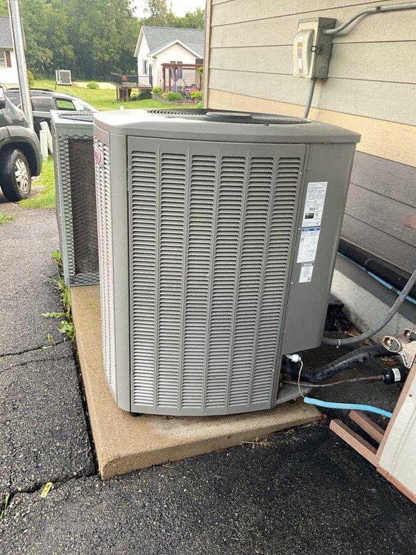 Responded to no-cooling condition on 3-year-old kitchen A/C unit displaying error code indicating lost power to inverter. Found unit non-operational with error code present. Verified incoming voltage at 218V. Reset system after determining recent power issues may have caused fault. Unit restarted successfully and ran for 30 minutes with normal operation restored. Cleaned condenser coil due to heavy dirt accumulation affecting performance. Advised that intermittent inverter power loss could indicate failing inverter board or display board if issue recurs. Prepared estimate for inverter board and display board replacement as preventative measure.