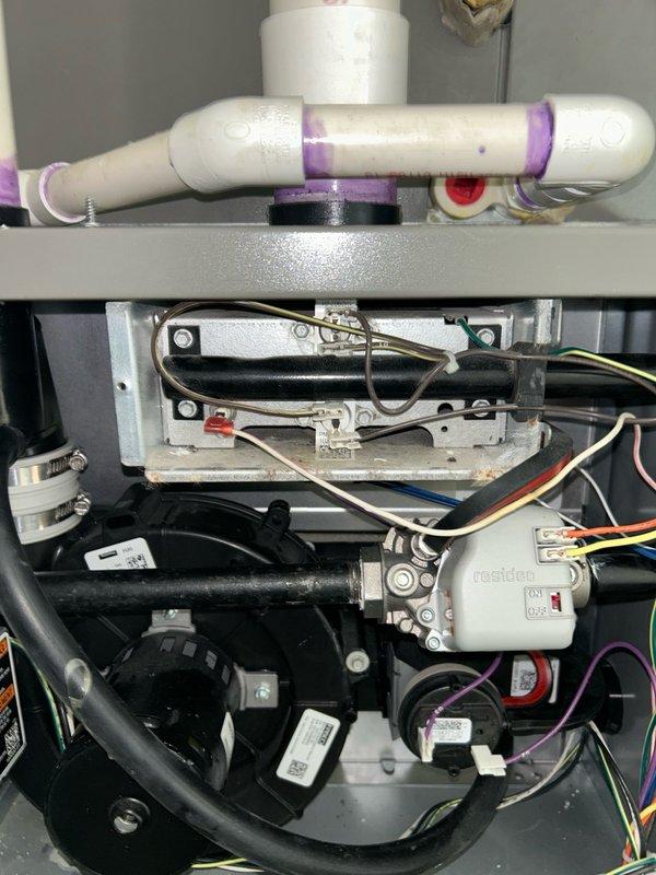 Completed comprehensive furnace tune-up and maintenance inspection on two gas furnace units (one approximately 1 year old, the other 4-5 years old) as part of recurring preventative maintenance agreement. Performed thorough system evaluation including thermostat operation verification, air filter assessment, blower assembly inspection, burner and heat exchanger compartment examination, inducer operation check, ignition system testing, flame sensor inspection, safety control verification, electrical component assessment, and condensate drain evaluation where applicable. Measured and confirmed temperature rise across heat exchangers within manufacturer specifications. All operational readings fell within normal operating parameters with no mechanical deficiencies or safety concerns identified at this time. Both furnace systems verified to be operating properly and efficiently. Recommended ongoing filter maintenance, coil cleaning, and continued adherence to scheduled tune-up intervals to
