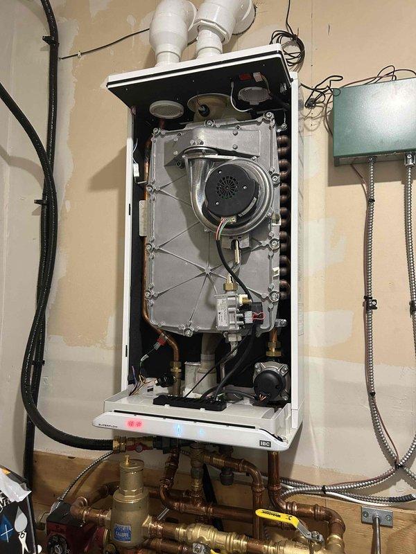 Completed scheduled heating maintenance on 18-year-old Lennox system as part of membership agreement. Performed comprehensive furnace and boiler inspection per standard maintenance protocols with no issues identified. Inspected tankless water heater internal components including heat exchanger, combustion chamber, and blower assembly; verified proper operation of gas lines, electrical connections, and exhaust venting. Examined kitchen plumbing fixture including faucet cartridge and valve assembly. All systems operating within normal parameters with no repairs required at this time.