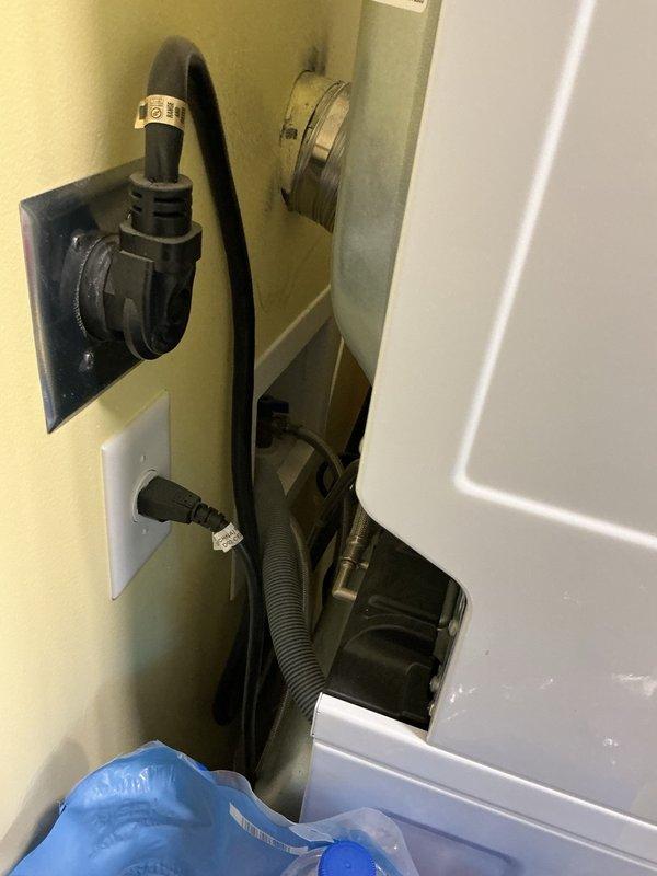 Completed annual plumbing inspection of residential property including water heater, laundry connections, and bathroom fixtures. All plumbing systems found to be in good working condition with no leaks or deficiencies noted. Cleaned water heater filter and installed hose adapter to improve accessibility for future maintenance.