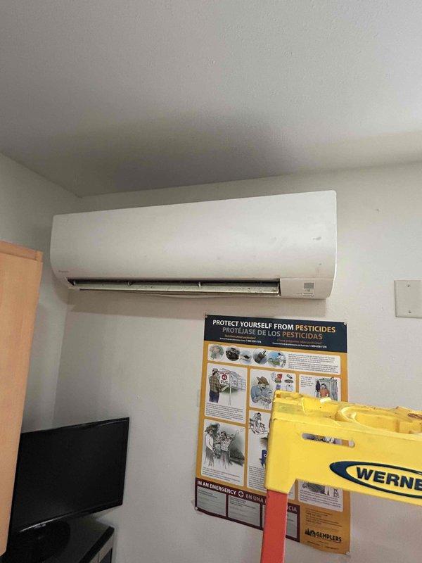 Responded to no-cool complaint on 10-year-old Dacon mini split system displaying flashing green error light. Upon inspection, discovered outdoor condenser coil completely obstructed with hardened gypsum dust buildup that had solidified to concrete-like consistency, preventing proper airflow and heat exchange. Thoroughly cleaned condenser coil to restore airflow and system operation. Verified proper cooling performance with 20+ degree temperature split across evaporator coil. Monitored system operation for 20 minutes to confirm stable performance and error code clearance. Unit returned to normal cooling operation.