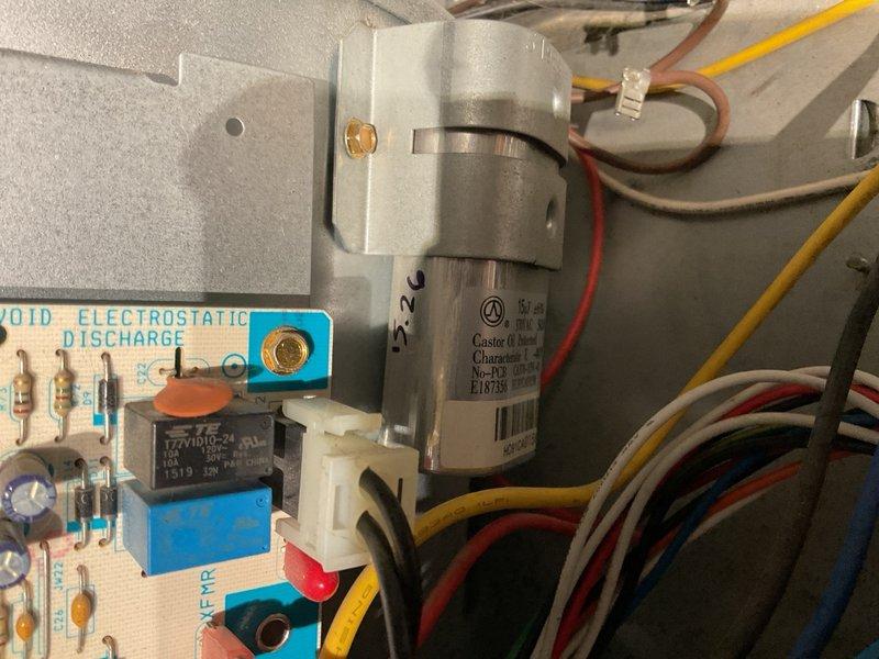 Completed annual maintenance inspection on an 11-year-old ICP furnace under family rewards program. System operated normally with all electrical components testing within acceptable parameters: inducer capacitor rated 5 µF tested at 4.970 µF, and blower motor capacitor rated 15 µF tested at 15.6 µF. Performed combustion analysis which showed initial CO reading of approximately 110 ppm, stabilizing to 62 ppm after 15 minutes of runtime. Identified environmental concerns including two cat litter boxes positioned near the furnace and visible gaps in the furnace cabinet allowing dust and debris infiltration into the unit. Evidence of cat litter contamination observed inside cabinet with potential impact on burner and heat exchanger areas, though no operational failure present at time of service. Recommended sealing all cabinet gaps, relocating litter boxes away from equipment, improving housekeeping practices around furnace area, and monitoring combustion readings during future maintenance