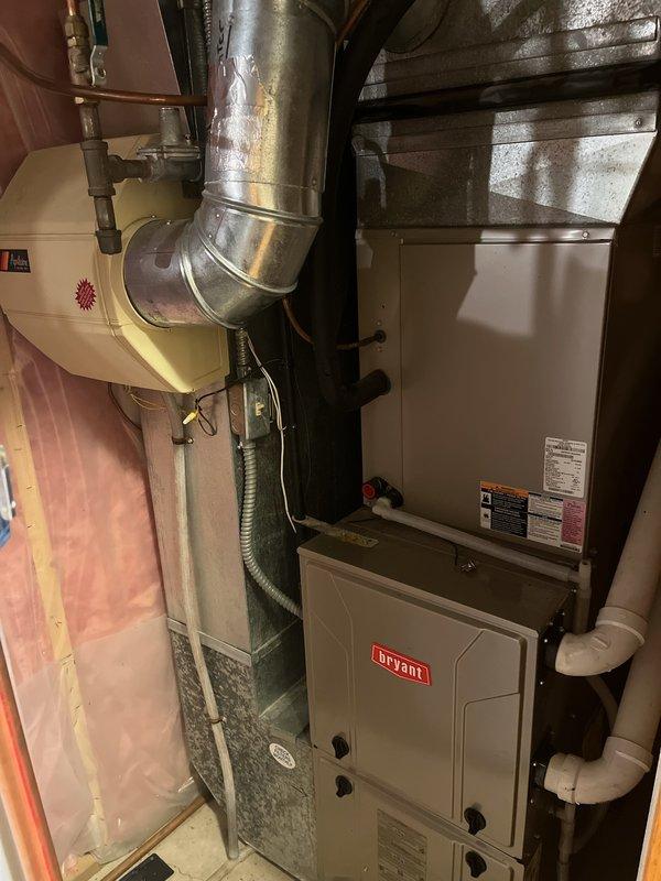 Completed comprehensive furnace and air conditioning maintenance on 13-year-old Bryant HVAC system. Identified and replaced faulty dual capacitor that was out of specification and noisy draft inducer motor to restore proper system operation. Discussed system performance and upgrade options with homeowner, noting units are functioning well overall despite age.