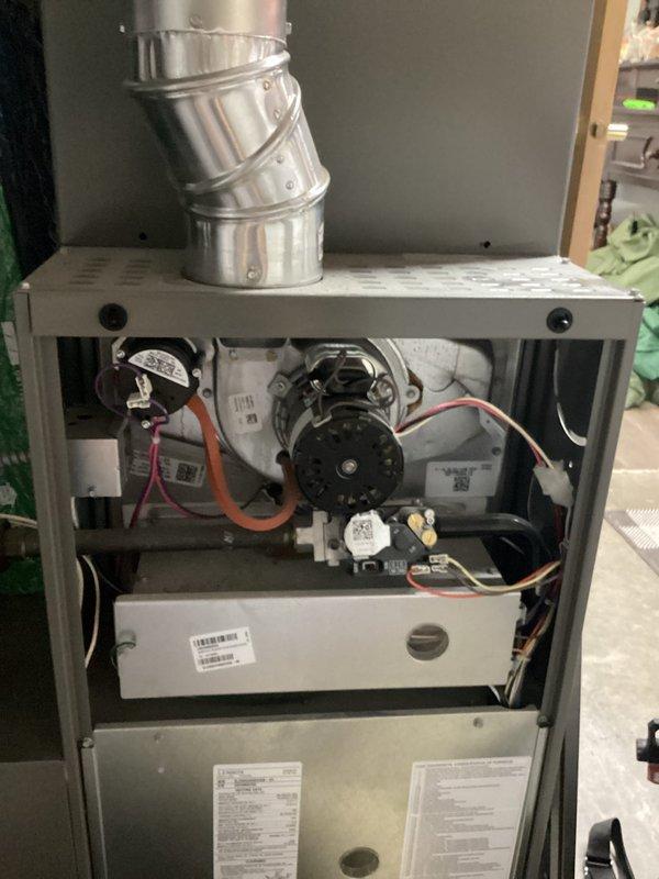 Responded to no cooling complaint on 4-year-old system. Upon arrival, connected manifold gauges to system and confirmed refrigerant charge was low. Homeowner reported another service company had recharged the system approximately two weeks prior without adding leak detection dye. System experienced freezing at outdoor unit shortly after previous service, indicating ongoing refrigerant loss. Inspected furnace interior components and air filtration system. Provided estimates for complete leak detection service to locate source of refrigerant loss. Homeowner elected to contact previous service company to address the issue before proceeding with leak testing. No repairs completed at this time pending homeowner decision on next steps.