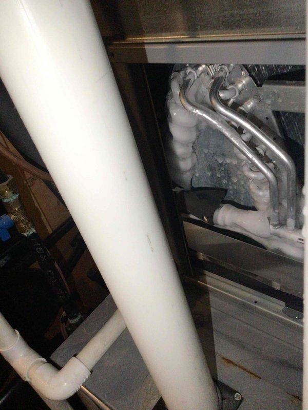 Responded to no cooling complaint on 5-year-old residential HVAC system. Upon inspection, discovered evaporator coil completely iced over, preventing proper heat exchange and airflow. System was shut down with thermostat fan set to "on" position to allow ice to melt naturally over 24-hour period before further diagnostic work could be performed. Provided preliminary estimate for suspected low refrigerant charge based on customer report of diminished cooling capacity throughout current cooling season compared to previous year's performance. Scheduled return visit for complete system diagnostic once coil has fully defrosted to accurately identify root cause of icing condition and determine appropriate repair solution.