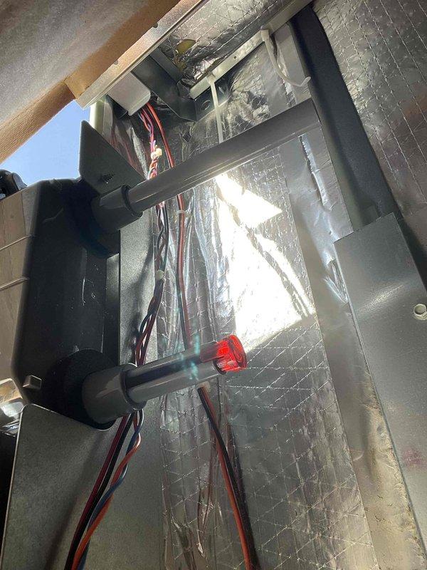 Replaced defective return air smoke detector under warranty. Reconfigured exhaust and intake pipe orientation on new detector to improve airflow and ensure proper air sampling capability. Verified system operation for 30 minutes post-installation to confirm detector functionality and proper performance.