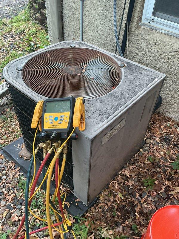 Responded to no cooling complaint on 38-year-old air conditioning system. Upon arrival, unit was operational following customer reset of system after overnight shutdown. Diagnosed failing contactor exhibiting excessive buzzing and intermittent operation, which caused system shutdown requiring manual reset. Observed compressor drawing high starting amperage, indicating motor wear consistent with unit age. Electrical connections showed significant corrosion, dust accumulation, and environmental degradation. System currently operational but contactor failure imminent and compressor nearing end of service life. Recommended full system replacement due to age and condition of components. Scheduled replacement estimate appointment.