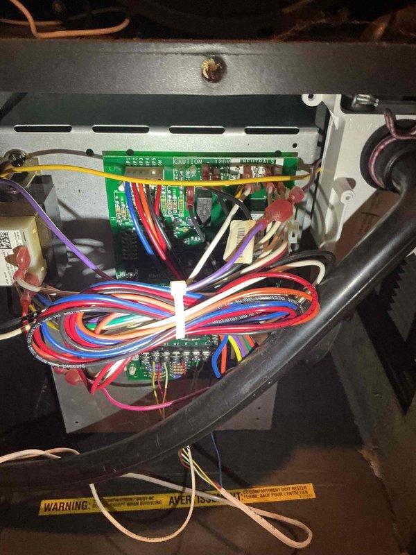 Responded to no cooling complaint on 7-year-old Daikin air conditioning system as follow-up to initial diagnostic visit. Verified proper refrigerant charge and conducted comprehensive system evaluation. Discovered evaporator coil experiencing partial cooling with only bottom third achieving proper temperature while remainder stayed warm. Performed hot and cold test on thermostatic expansion valve (TXV) which confirmed valve operating correctly, eliminating TXV failure as root cause. Diagnostic findings indicate plugged capillary tubes at TXV outlet preventing proper refrigerant distribution through evaporator coil. Documented system conditions with photographs of control board wiring and coil temperature readings showing 63°F on affected section. Submitted parts request for evaporator coil replacement estimate and coordinated service advisor appointment for customer to review repair versus system replacement options.