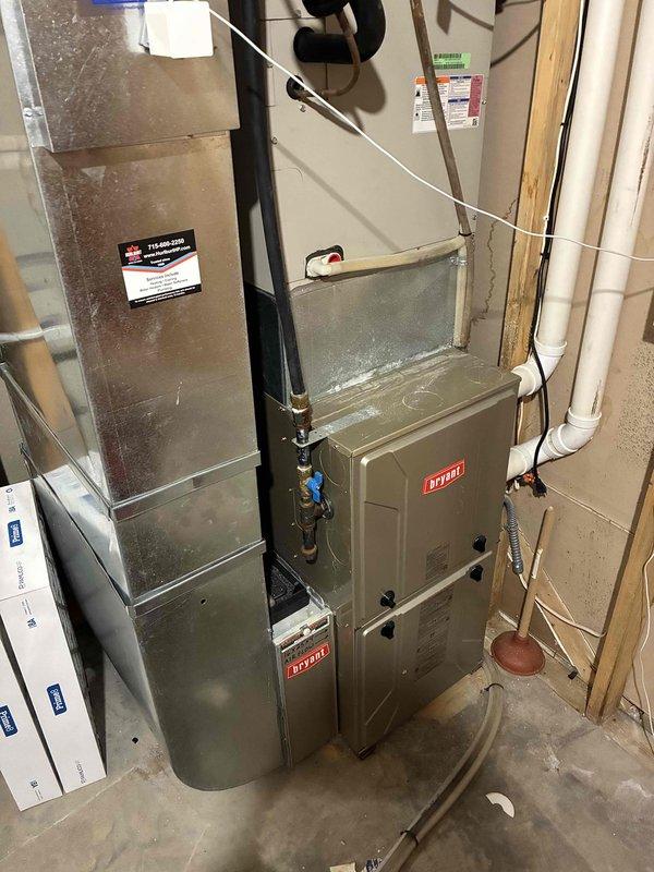 Performed preventive maintenance on residential central air conditioning system and Mitsubishi mini-split unit. Both outdoor condensers were heavily plugged with debris and thoroughly cleaned to restore proper airflow. Cleaned mini-split filters and verified furnace air filter condition. Flushed drain lines on both systems with hot water and vacuumed mini-split drain line to clear blockages and ensure proper condensate drainage. Tested electrical components including capacitor and contactor on both units, all readings within manufacturer specifications. Verified system performance with temperature split measurements exceeding 20 degrees on both units, confirming adequate cooling capacity and refrigerant charge. Both systems operating properly with no deficiencies identified.