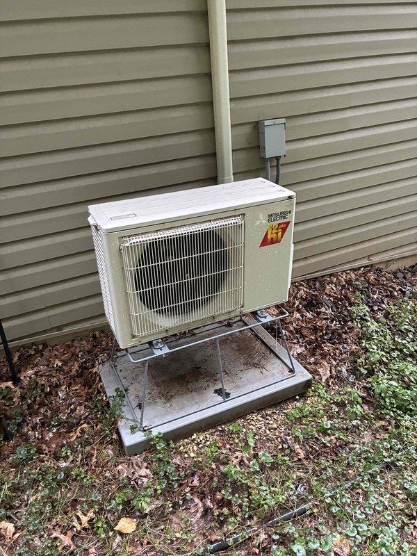 Performed preventive maintenance on residential central air conditioning system and Mitsubishi mini-split unit. Both outdoor condensers were heavily plugged with debris and thoroughly cleaned to restore proper airflow. Cleaned mini-split filters and verified furnace air filter condition. Flushed drain lines on both systems with hot water and vacuumed mini-split drain line to clear blockages and ensure proper condensate drainage. Tested electrical components including capacitor and contactor on both units, all readings within manufacturer specifications. Verified system performance with temperature split measurements exceeding 20 degrees on both units, confirming adequate cooling capacity and refrigerant charge. Both systems operating properly with no deficiencies identified.