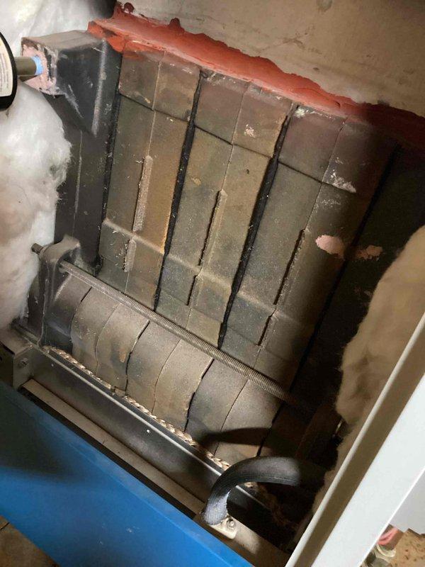 Completed preventative maintenance on residential boiler system. Corrected low water pressure by adding water to the system, cleaned igniter assembly by brushing off accumulated debris, and performed comprehensive safety inspection including carbon monoxide leak testing. All operational parameters verified within normal range, unit heating properly with no issues identified.