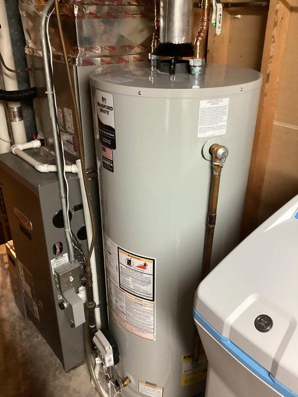 Replaced house side valve and indoor shut-off valve for exterior faucet. Both the house side valve and spigot valve were successfully replaced and tested for proper operation. Work completed in basement utility area with copper piping connections properly secured.