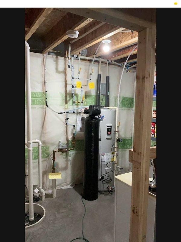 Responded to callback for hot water recirculating pump installed previously. Customer reported no hot water at taps, with water temperature only reaching 75°F at inlet and 79°F at outlet of water heater. Recirculating pump was operating loudly and running hot, indicating air lock condition. Diagnosed small air pocket located at the pump assembly. Connected hose to boiler drains and successfully bled air from the system, restoring proper circulation and hot water delivery to fixtures throughout the residence.