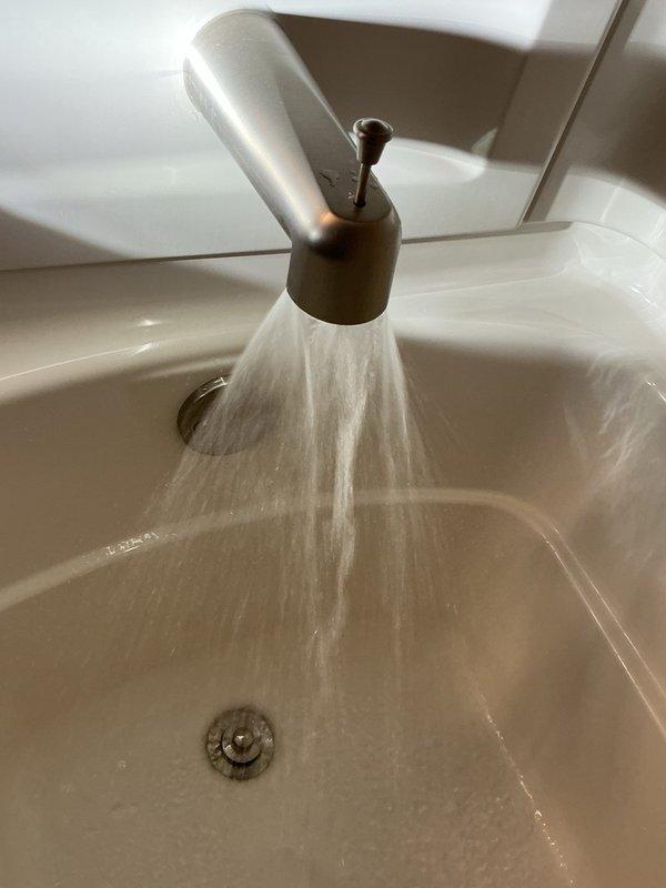 Responded to service call for malfunctioning bathtub spout with inoperative shower diverter mechanism. Upon inspection, determined existing tub spout had failed and required replacement. Removed defective spout and installed new chrome-finished tub spout. Verified proper water flow and diverter operation upon completion.