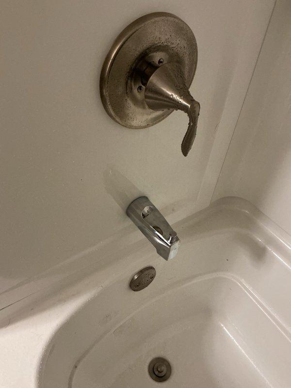 Responded to service call for malfunctioning bathtub spout with inoperative shower diverter mechanism. Upon inspection, determined existing tub spout had failed and required replacement. Removed defective spout and installed new chrome-finished tub spout. Verified proper water flow and diverter operation upon completion.