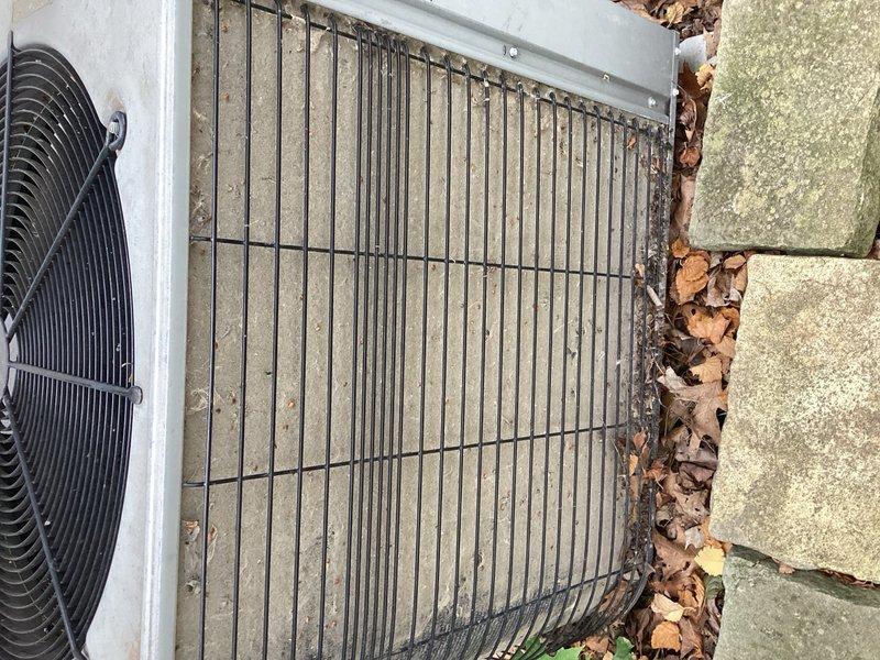 Responded to no cooling complaint on 21-year-old air conditioning system with interior temperature at 80 degrees. Previous technicians had replaced capacitor without resolution, and electrician determined issue was within AC unit rather than breaker. Upon arrival, verified furnace blower operation and confirmed control board signal to condenser. Found condenser breaker tripped and condenser coil blocked with debris. Performed electrical diagnostics on condenser components, reset tripped breaker, and cleared blocked condenser coil. Adjusted TXV bulb positioning and verified refrigerant charge levels within specification. Cycled system through complete operation and confirmed normal cooling function restored.