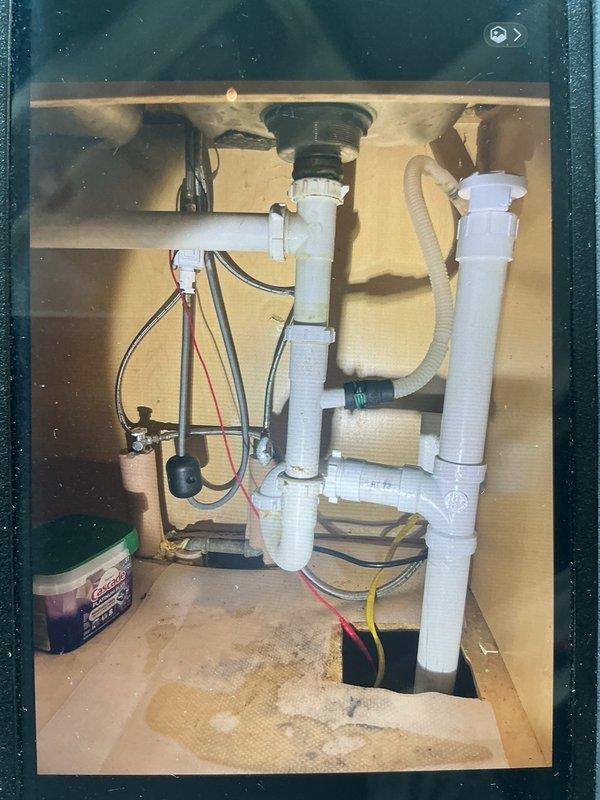 Responded to emergency water leak in basement where damaged pipe with gash was causing flooding into the home. Upon arrival, assessed the compromised supply line running from basement to kitchen sink and determined complete pipe replacement was necessary. Removed the damaged section and installed new piping from the basement through to the kitchen sink connection. Tested all connections and verified system integrity with no leaks detected upon completion.