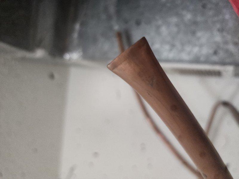 Responded to gas service disconnection where utility company identified two uncapped gas lines requiring immediate attention. Successfully capped gas supply lines for both the clothes dryer and kitchen range per safety requirements to allow gas service restoration to the property. Both copper gas line terminations were properly sealed and secured to meet code compliance standards.