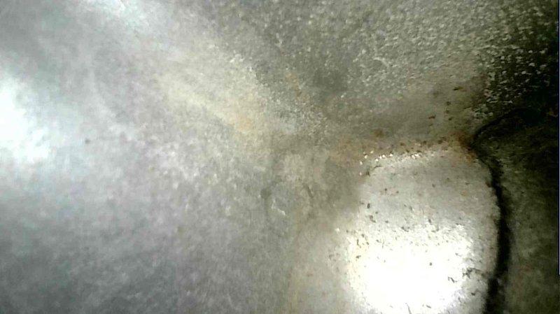 Responded to no cooling call and performed scheduled AC tune-up. Upon inspection, discovered cracked heat exchanger, broken flame sensor, low refrigerant levels, and failed capacitor. Due to the combination of critical safety issues with the heat exchanger, multiple component failures, and the age of the unit making repairs cost-prohibitive, recommended complete system replacement. Documented conditions with diagnostic photos showing equipment deterioration and temperature readings.