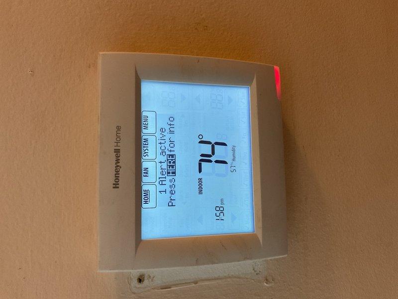 Responded to no-cool complaint on 4-year-old system where AC was running constantly without cycling off. Performed comprehensive diagnostics on Honeywell Home thermostat (Model TH8321R1001) and system operation. Verified system was cooling properly but running extended cycles due to extreme outdoor temperatures and significant heat load on older home construction. Conducted system shutdown test which confirmed 2-degree temperature rise within minutes, indicating heavy thermal gain. Determined equipment was functioning as designed under high ambient conditions and explained normal operational parameters to customer.