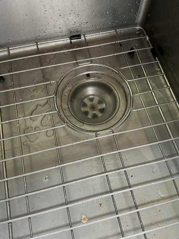 Responded to a kitchen sink drain blockage. Upon arrival, performed video scope inspection which revealed multiple blockage points throughout the drain line. Cabled the drain line to full cable length, successfully clearing the obstruction and restoring drainage. Flushed the kitchen sink multiple times to remove residual debris from the line. Conducted follow-up video scope inspection which identified a structural issue in the last 30 feet of the drain line—a belly (sag) in the pipe that restricts solid waste flow and may contribute to future drainage problems. Drain is currently functional but homeowner advised of the underlying pipe configuration issue that could require future attention.