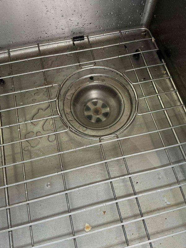 Responded to a kitchen sink drain blockage. Upon arrival, performed video scope inspection which revealed multiple blockage points throughout the drain line. Cabled the drain line to full cable length, successfully clearing the obstruction and restoring drainage. Flushed the kitchen sink multiple times to remove residual debris from the line. Conducted follow-up video scope inspection which identified a structural issue in the last 30 feet of the drain line—a belly (sag) in the pipe that restricts solid waste flow and may contribute to future drainage problems. Drain is currently functional but homeowner advised of the underlying pipe configuration issue that could require future attention.