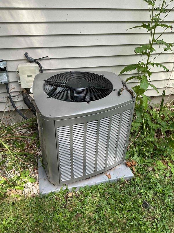 Responded to warranty call for constant knocking noise from Lennox condensing unit while running. Upon inspection, discovered deceased rodent and biological debris around condenser fan blades and inside unit housing. Removed condenser fan assembly, extracted rodent remains, and cleaned affected components. Reassembled unit, verified normal operation with no abnormal noise present and system cooling properly.
