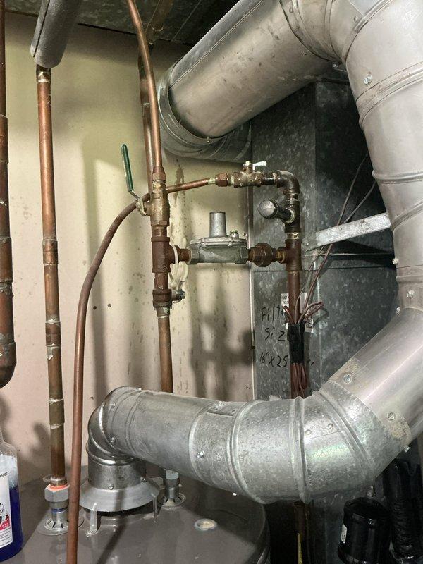 Removed capped gas line original to 1980s construction from mechanical room. During inspection, identified possible micro leak at lower fitting connected to AC unit; although previous leak tests passed, removed and reinstalled fitting with fresh connections as preventative measure. Assessed and provided solutions for both front and rear exterior sillcocks to ensure proper function and winterization capability.