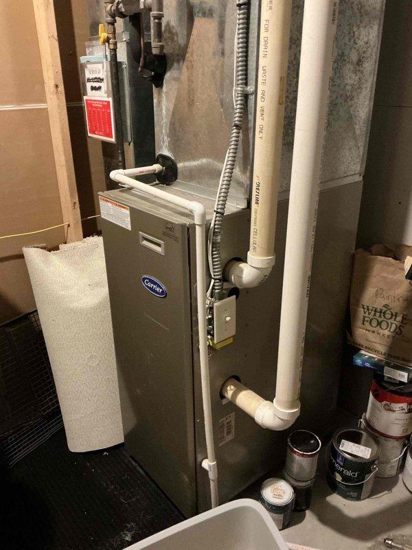 Responded to no cooling complaint with indoor temperature at 80°F. Found severely restricted air filter at furnace which was replaced with homeowner-supplied filter. Outdoor unit contactor was buzzing but compressor and condenser fan motor were not running. Tested electrical components and determined dual run capacitor had failed. Replaced defective capacitor, verified proper system startup, and confirmed unit returned to normal cooling operation. Advised homeowner on importance of regular filter maintenance.
