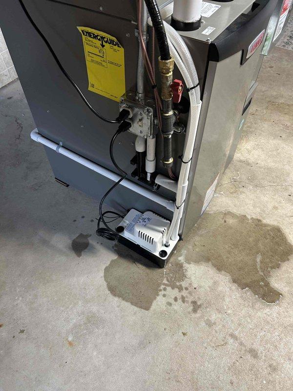 Responded to a recurring water leak issue at the base of the HVAC system. Upon inspection, found moisture accumulation beneath the condensate pump, indicating pump failure. Replaced the defective condensate pump with a new unit and verified proper drainage operation. System tested and confirmed operating correctly with no further water leakage observed.